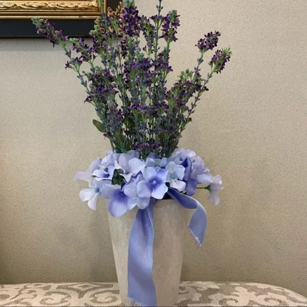 Purple Flowers in Cream Resin Vase‎